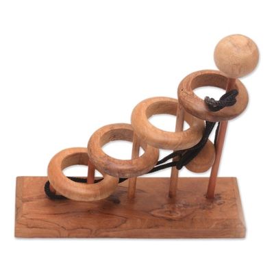 Alternate image for Artisan Crafted Teak Wood Desktop Puzzle Game from Java Magic Knot