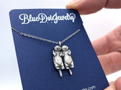 Alternate image for Two Silver Otters Holding Hands Necklace