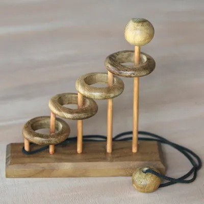 Primary image for Artisan Crafted Teak Wood Desktop Puzzle Game from Java Magic Knot